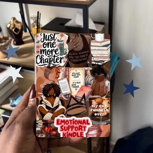May include: A decorative Kindle case with a collage design. The design includes the text "Just one more Chapter", "BLACK WOMEN ARE THE PUREST FORM OF ART", "It's not how you read, it's that you read", and "EMOTIONAL SUPPORT KINDLE". The case is brown and tan.