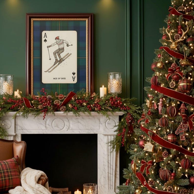 May include: A festive Christmas scene featuring a decorated tree with red ornaments and ribbon. A framed Ace of Skis playing card hangs above a fireplace adorned with garland, candles, and berries. The room has a cozy, holiday atmosphere.