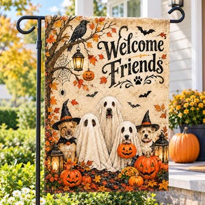 May include: A rectangular garden flag featuring the text Welcome Friends with a paw print. The design displays two dogs wearing witch hats, two dogs dressed as ghosts, a black crow, bats, a spider web, lanterns, and several orange pumpkins.