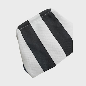 May include: A pouch featuring a bold, repeating pattern of thick vertical black and white stripes. The fabric has a visible, fine-textured weave throughout the entire surface, and the pouch is constructed with clean, stitched seams along the top edge.