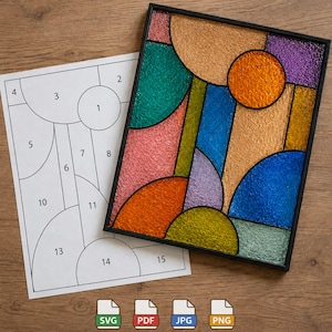 May include: A stained glass panel with a black frame, featuring a geometric design in shades of orange, blue, green, purple, and pink. A paper with a numbered diagram is next to the panel. SVG, PDF, JPG, and PNG icons are at the bottom.