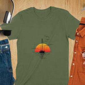Sunset Sailboat T-Shirt, Nautical Sunset Graphic Tee, Ocean Sailing T-Shirt, Coastal Beach Life Shirt, Seaside Adventure Tee