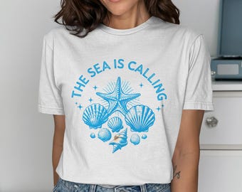 The Sea Is Calling T-Shirt: Seashell Graphic, Coastal Vacation Tee