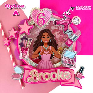 May include: A pink and glittery birthday cake topper with the name "Brooke". The design includes a cartoon girl, a heart with the number 6, makeup, and the word "Pretty" on a hairdryer. The topper is decorated with stars and makeup brushes.
