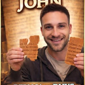May include: Image of a man holding two pieces of aged parchment with text. The text on the parchment reads in a script. The background features the words "OLDEST GOSPEL OF JOHN" and "REPLICA BY RHYS".
