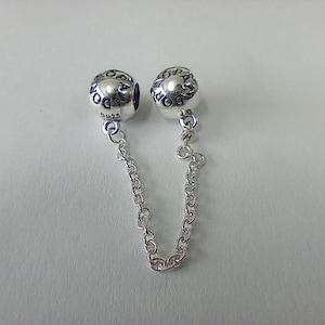 pandora silver logo safety chain charm