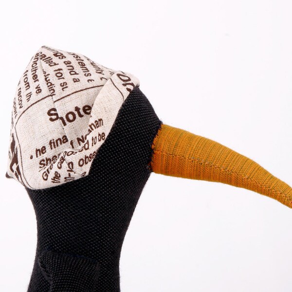 Dark soft penguin or bird  With Deep yellow beak Newspaper hat and  gray Plaid pants- handmade fabric doll