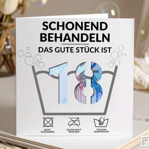 Cadeau en espèces pour un 18e anniversaire – carte pliante amusante avec symbole de lessive et numéro perforé