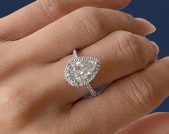 Anillo de compromiso con halo de diamantes cultivados en laboratorio de 2 quilates en forma de pera, talla pera VVS2 F, banda pavé, certificado por IGI.