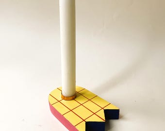 Unique handmade candle holder in the shape of a tulip, wooden candlestick in a retro checkered design, as a gift, with acrylic paints