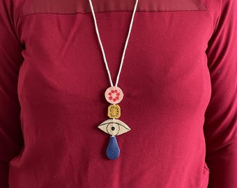 Unique handmade necklace with leather pendant, jewelry, pendant as a Valentine's Day gift in boho-hippie style with eye