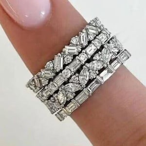 May include: A rustic wooden sign with the text "Welcome to our home" in white lettering. The sign features a distressed finish and a simple, inviting design, perfect for front door decor.