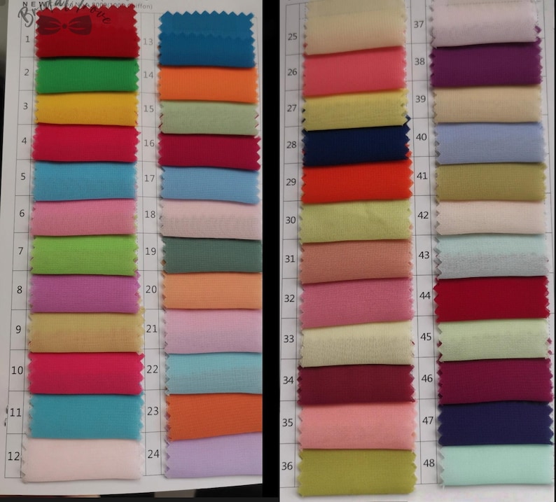 May include: A color swatch chart featuring 48 fabric samples in a variety of colors. The samples are arranged in rows and columns, with each sample labeled with a number. Colors include red, green, blue, orange, pink, purple, and yellow.