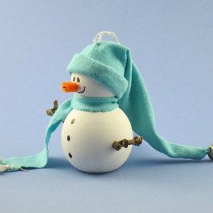 Ornament: Wooden Snowman with Floppy Turquoise Hat and Scarf with Jingle Bell