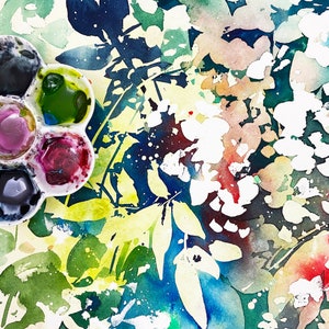 May include: A watercolor painting of a floral design with a palette of paint colors in the bottom left corner. The painting features a variety of colors, including blue, green, yellow, pink, and white.