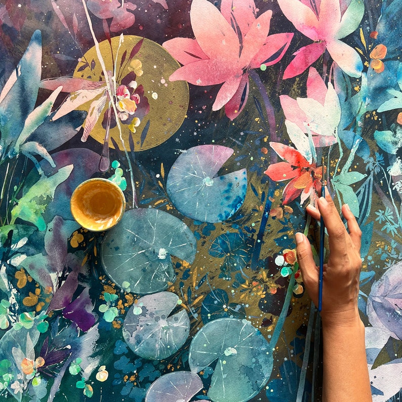 May include: Abstract watercolor painting featuring blue and green water lily leaves, pink and red flowers, and gold accents. A small, round, brown ceramic dish is in the lower left corner of the image.