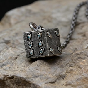 May include: A rustic wooden sign with the text "Welcome to our home" in white lettering. The sign features a distressed finish and a simple, inviting design, perfect for a front porch or entryway.