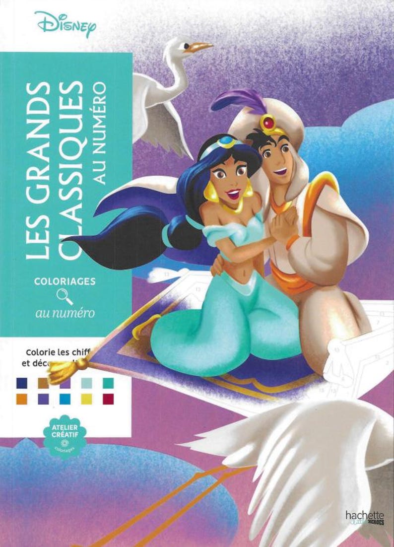 May include: A Disney coloring book featuring Aladdin and Jasmine on a magic carpet. The cover has the text "LES GRANDS CLASSIQUES AU NUM&Eacute;RO" and "COLORIAGES au num&eacute;ro". The background is purple with white birds.