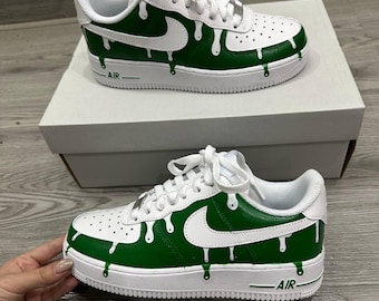 Custom-painted Air Force 1 Drip shoes: Personalized AF1s with custom name printing.