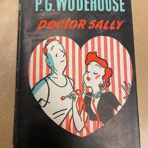 May include: Vintage book cover for "Doctor Sally" by P.G. Wodehouse. The cover features a black background with the title in teal and red. A heart-shaped illustration shows a man and woman with medical equipment.