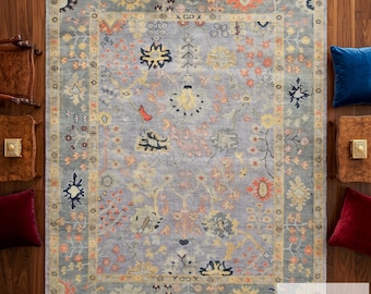 Alfombra Oushak azul grande con diseño oriental y borde para decoración de interiores del hogar.