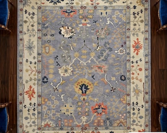 Alfombra Oushak azul grande con diseño oriental y borde para decoración de interiores del hogar.