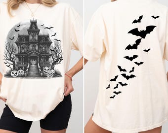 Maglietta vintage con colori comodi e motivo casa stregata - Maglietta spettrale di Halloween