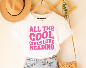 Bookish Tee Shirt with Retro Aesthetic and Hot Pink Text: All The Cool Girls Love Reading, Gift for Romance Reader or Book Author, Librarian