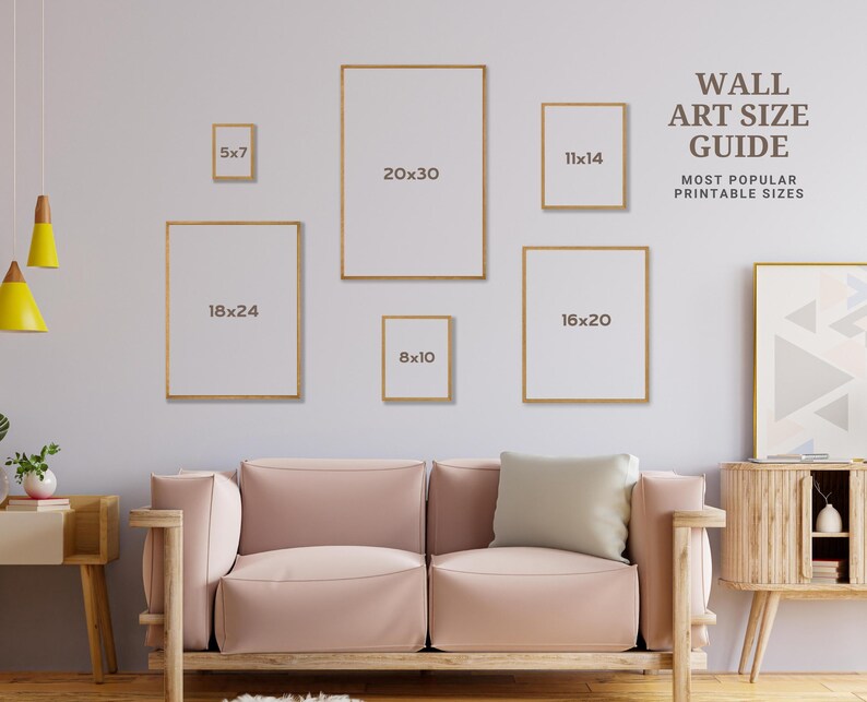 May include: A wall art size guide with different frame sizes in inches, including 5x7, 8x10, 11x14, 16x20, 18x24, and 20x30. The guide is displayed on a wall with a couch and a side table in front of it.