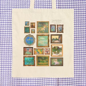 May include: A cream tote bag displaying a collection of framed paintings, including landscapes and floral art. The bag features the quote: "I must have flowers, always, and always." The background is a purple and white houndstooth pattern.