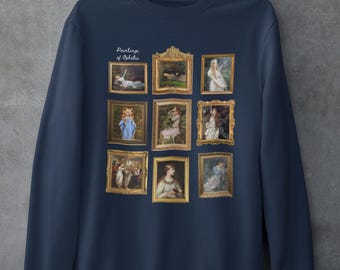 Puede incluir: Sudadera azul marino con un estampado de nueve pinturas enmarcadas de Ophelia. El texto "Paintings of Ophelia" está impreso sobre las pinturas.