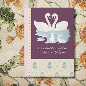 May include: A hardback book with a purple cover showing two white swans in a heart shape. The text "romance novels: a dissertation" is below the swans. The book has a pale pink spine and a patterned base.