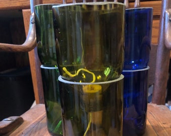 self watering reclaimed wine bottle planter olive green with polished edge