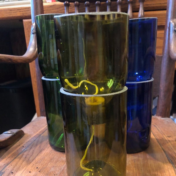 self watering reclaimed wine bottle planter olive green with polished edge