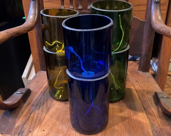 self watering reclaimed wine bottle planter blue with polished edge