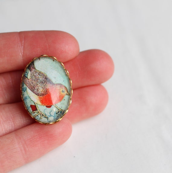 Vintage robin brooch deals