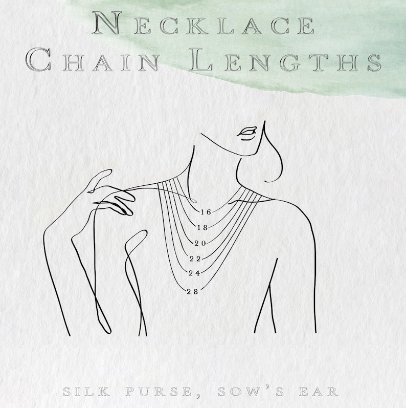 May include: An illustration showing necklace chain lengths. The image features a line drawing of a person with various necklace lengths labeled 16, 18, 20, 22, 24, and 28 inches. The text "NECKLACE CHAIN LENGTHS" is at the top.