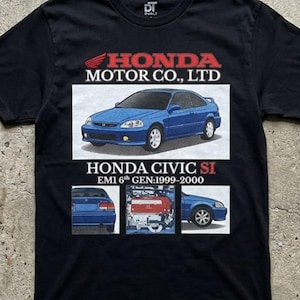 May include: Black t-shirt with a blue Honda Civic Si car graphic. The shirt displays the Honda Motor Co., Ltd. logo and text: "HONDA CIVIC SI EMI 6th GEN:1999-2000". The tee has a crew neck and short sleeves.