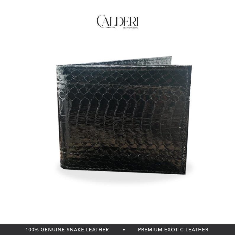 May include: A black bi-fold wallet made of genuine snake leather. The wallet has a textured, scale-like pattern and a glossy finish. The brand name "CALDERI" is visible at the top.