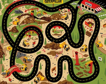 May include: A colourful play mat featuring a winding black road with yellow dashed lines, cartoon construction vehicles, piles of dirt, green trees, and a red-roofed Caterpillar building. The design includes various construction site elements.