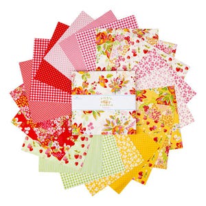 May include: A set of 18 fabric squares featuring a variety of floral and geometric patterns in red, white, yellow, and green. The fabric squares are arranged in a fan shape and labeled "Picnic Florals".