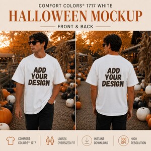 May include: A white short-sleeve t-shirt featuring the text ADD YOUR DESIGN in dark brown letters on both the front and back. The shirt is displayed in a split-view format showing the front and back views of the garment in a pumpkin patch.