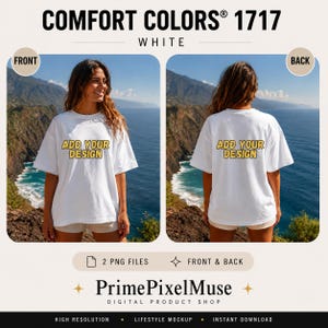 May include: A white Comfort Colors 1717 t-shirt shown from the front and back, featuring the text ADD YOUR DESIGN in yellow letters on the chest and back. The shirt is displayed in two separate views against a coastal landscape background.