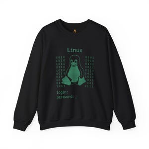 May include: Black crewneck sweatshirt with a green graphic of the Linux penguin mascot, binary code, and the word "Linux". The text "login: password: _" is also printed on the sweatshirt.