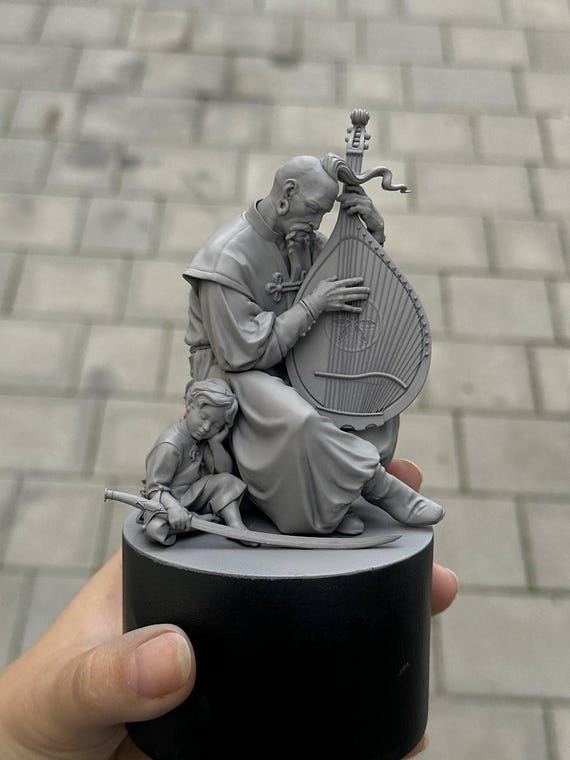 Kobzar Musician and Child with Sword Sculpture