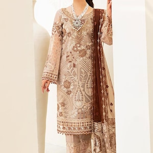 Pakistani organza embroidered salwar kameez made on custom order