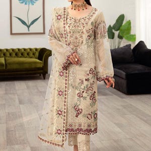 Pakistani organza embroidered salwar kameez made on custom order