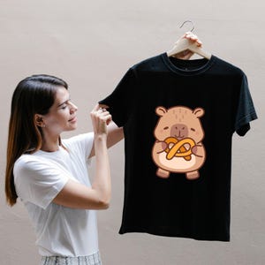 Cute Capybara SVG Bundle,Instant Digital Download for Cricut & Silhouette,Digital Sticker,Cute Capybara PNG,Kawaii Animal Illustration
Cute Capybara SVG Bundle,Kawaii Capybara Clipart,Instant Digital Download for Cricut & Silhouette,High-Quality Printing,Animal Illustration
Cute Capybara SVG Bundle, Capybara Animal Shirt Png, Capybara Digital Stickers, Kawaii Capybara Clipart, Capybara Vector Summer Shirts Svg