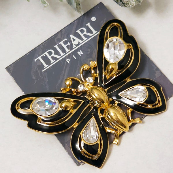 Vintage TRIFARI TM Black Enamel and Clear Rhinestone Butterfly Brooch with a Gold tone Setting