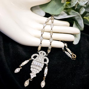 Antique 1920s Art Deco Lavalier Necklace with Baguette Rhinestones and Pot Metal Setting.
